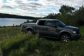 Manager onsite supervising a rural move. We take professional service seriously.